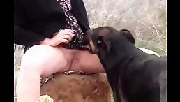 Blonde dirty MILF fucking her dog outdoor